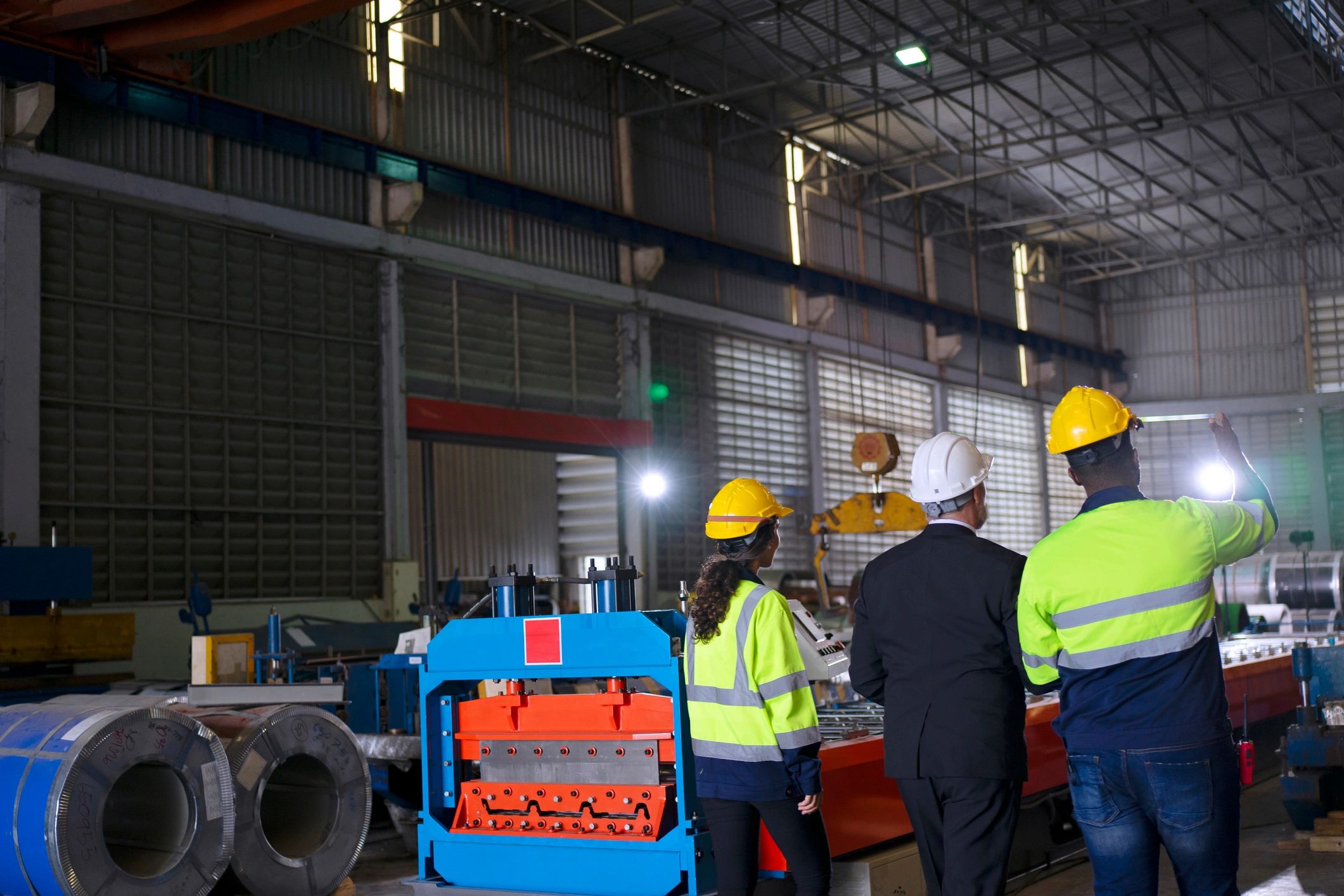 Engineer reviewing factory installation area